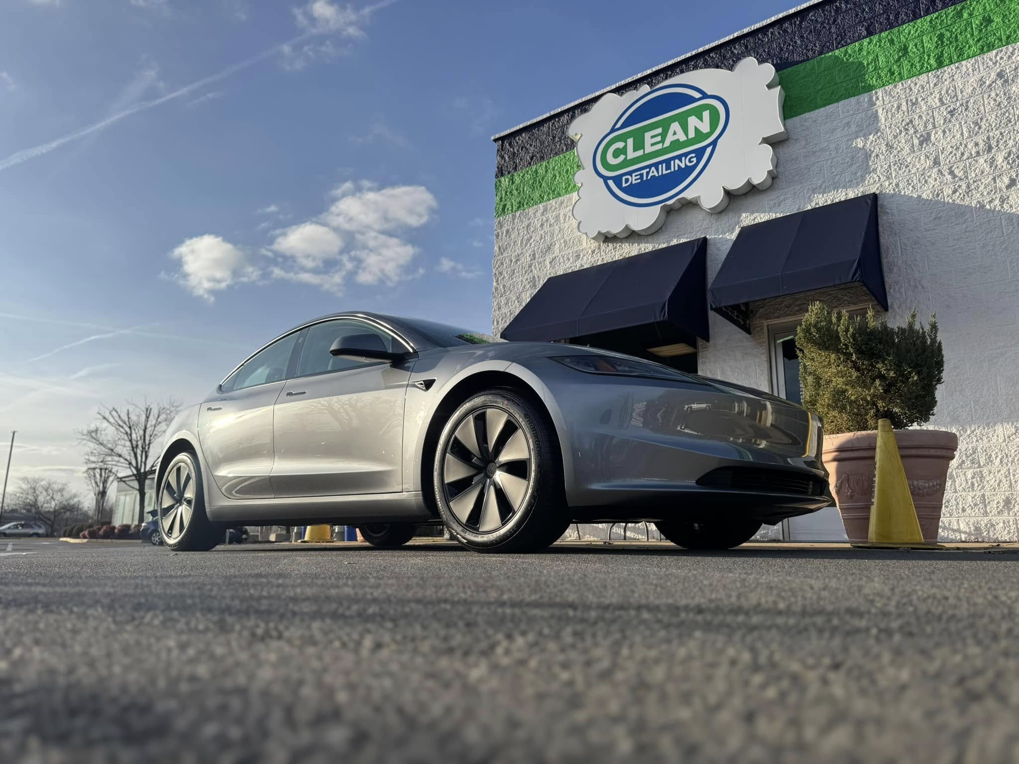 A photo of a silver sports car that received self-healing ceramic coating at Clean Car Wash and Detail in Fredericksburg, VA.
