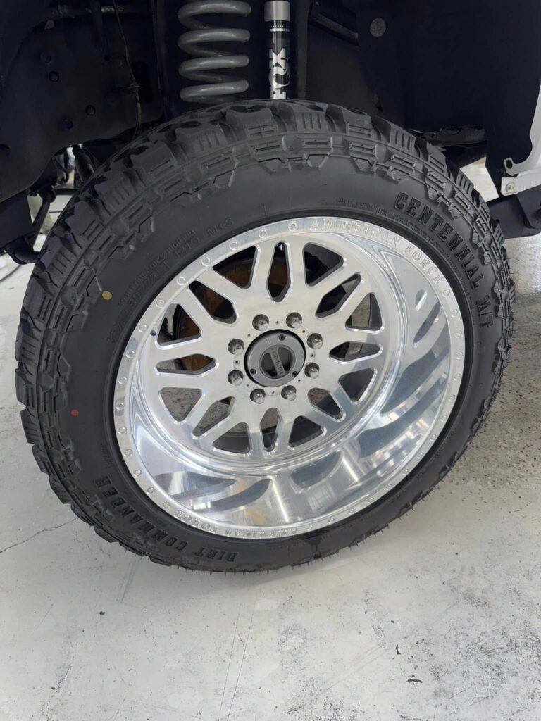 The after photo of the clean rim of a truck at Clean Car Wash and Detail in Fredericksburg, VA.